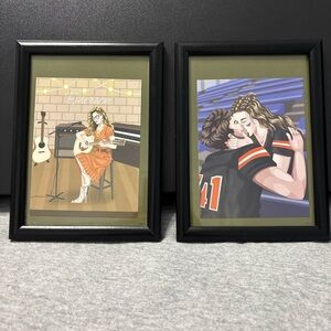 Two 7x5 picture frames. Matte black wood trim